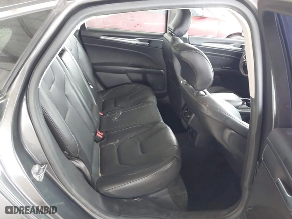 2016 Ford Fusion Energi Titanium with VIN 3FA6P0SU9GR103245, listed as a IAAI auction lot 41888435 with 123,975 mi miles. Bid and sale history available at carsss.com. Image 8.