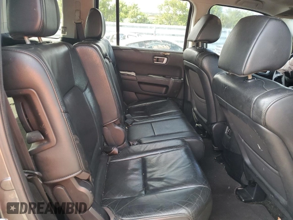 2013 Honda Pilot EX-L с VIN 5FNYF3H54DB014106, выставлен на аукционе Copart как лот 59169735 с пробегом 180 666 миль миль и Списание • Salvage title. История ставок и продаж доступна на DreamBid. Изображение 11.