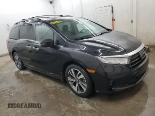 2022 Honda Odyssey Touring with VIN 5FNRL6H88NB051038, listed as a Copart auction lot 56995315 with 108,534 mi miles and Salvage title. Bid and sale history available at DreamBid. Image 4.