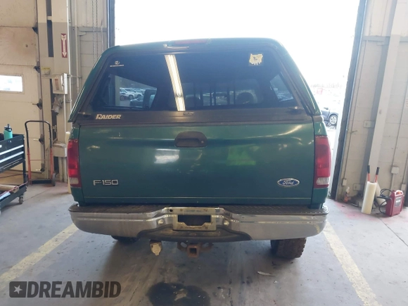 1997 Ford F-150 XL with VIN 1FTEX18L1VKB44867, listed as a IAAI auction lot 41266572 with 105,061 mi miles. Bid and sale history available at carsss.com. Image 16.