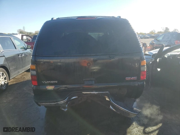 2005 GMC Yukon SLT with VIN 1GKEK13T05J107678, listed as a Copart auction lot 77447784 with 269,040 mi miles and Salvage Title. Bid and sale history available at carsss.com. Image 6.