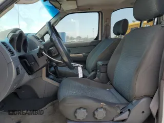 2004 Nissan Xterra XE z VIN 5N1ED28T04C659829, wystawiony jako Copart lot #57633085 z przebiegiem 180 057 mil mil oraz Szkody całkowita. Historia ofert i sprzedaży dostępna na DreamBid. Obrazek 7.