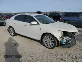 2013 Lincoln MKS EcoBoost with VIN 1LNHL9FT5DG610582, listed as a Copart auction lot 47366435 with 145,038 mi miles and Salvage title. Bid and sale history available at DreamBid. Image 4.