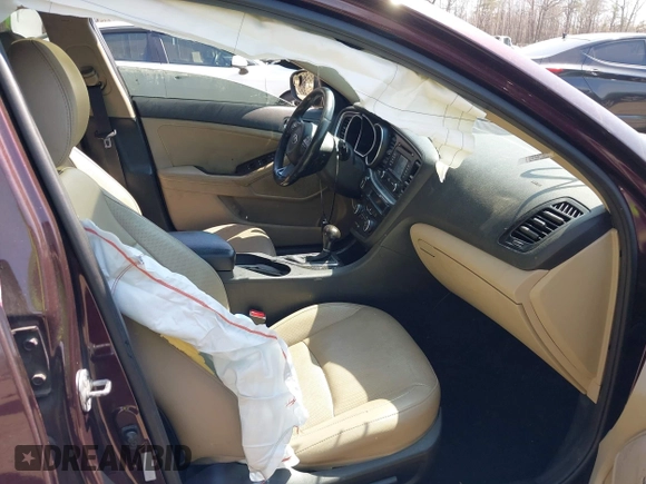 2014 Kia Optima EX with VIN 5XXGN4A70EG266191, listed as a IAAI auction lot 41895612 with 229,472 mi miles and . Bid and sale history available at carsss.com. Image 5.