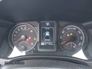 2023 Toyota Tacoma SR with VIN 3TMCZ5AN3PM633643, listed as a IAAI auction lot 41787399 with 4,313 mi miles and . Bid and sale history available at DreamBid. Image 7.