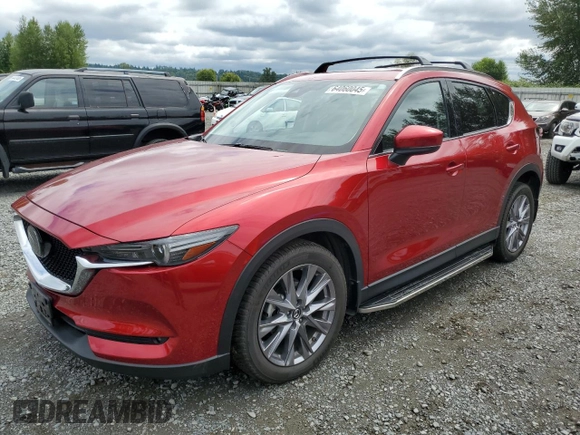 2019 Mazda CX-5 Grand Touring with VIN JM3KFBDM2K0639247, listed as a Copart auction lot 64060045 with 69,563 mi miles and Salvage title. Bid and sale history available at DreamBid. Image 1.