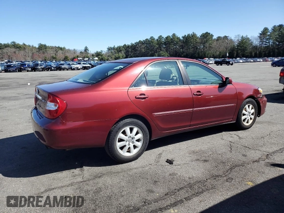 2004 Toyota Camry LE with VIN 4T1BE30KX4U297754, listed as a Copart auction lot 50795425 with 184,152 mi miles and Salvage Title. Bid and sale history available at DreamBid. Image 3.