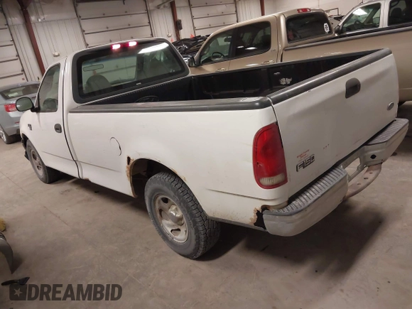 2000 Ford F-150 XL with VIN 1FTRF17W8YKB33949, listed as a IAAI auction lot 41519978 with 228,931 mi miles. Bid and sale history available at carsss.com. Image 3.