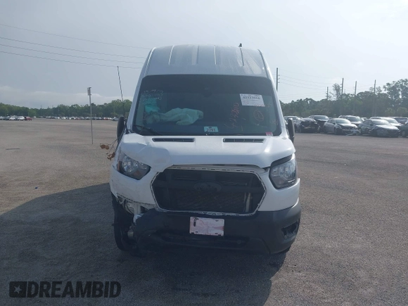 2022 Ford Transit Cargo с VIN 1FTBR3X87NKA74815, выставлен на аукционе IAAI как лот 42323910 с пробегом 57 064 миль миль и . История ставок и продаж доступна на DreamBid. Изображение 11.