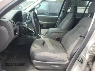 2005 Ford Explorer XLS with VIN 1FMZU72E15UA26499, listed as a Copart auction lot 58125945 with 196,774 mi miles and Salvage title. Bid and sale history available at DreamBid. Image 7.
