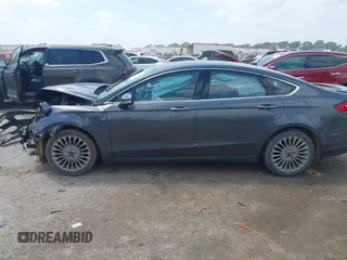 2016 Ford Fusion Titanium with VIN 3FA6P0K97GR217062, listed as a IAAI auction lot 42044943 with Not Provided miles and . Bid and sale history available at carsss.com. Image 15.