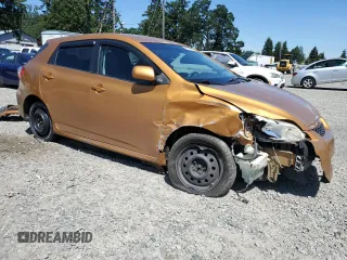 2009 Toyota Matrix S with VIN 2T1LE40E69C005921, listed as a Copart auction lot 58860675 with Not provided miles and Salvage title. Bid and sale history available at DreamBid. Image 4.