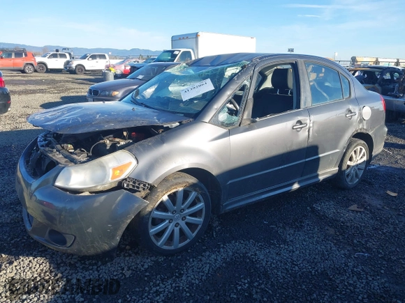 2010 Suzuki SX4 with VIN JS2YC5A40A6300053, listed as a IAAI auction lot 41392061 with 114,863 mi miles and . Bid and sale history available at DreamBid. Image 17.