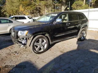 2011 Jeep Grand Cherokee Overland with VIN 1J4RS6GG7BC646610, listed as a Copart auction lot 79931614 with 188,601 mi miles and Salvage Title. Bid and sale history available at DreamBid. Image 1.