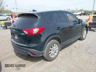 2016 Mazda CX-5 Sport with VIN JM3KE4BY8G0746377, listed as a IAAI auction lot 41990988 with 144,558 mi miles and . Bid and sale history available at carsss.com. Image 4.