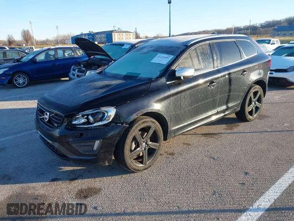 2014 Volvo XC60 R-Design Premier Plus z VIN YV4902DZ4E2537605, wystawiony jako IAAI lot #41126501 z przebiegiem 119 644 mil mil oraz . Historia ofert i sprzedaży dostępna na DreamBid. Obrazek 21.