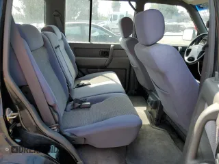 1999 Isuzu Trooper S z VIN JACDJ58X4X7926429, wystawiony jako Copart lot #72969694 z przebiegiem 160 843 mil mil oraz Szkody całkowita. Historia ofert i sprzedaży dostępna na DreamBid. Obrazek 11.