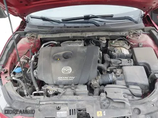 2016 Mazda Mazda3 i Grand Touring with VIN 3MZBM1N77GM245567, listed as a IAAI auction lot 41330883 with 128,423 mi miles. Bid and sale history available at carsss.com. Image 10.