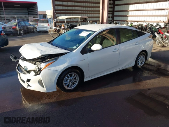 2017 Toyota Prius Two with VIN JTDKBRFUXH3549068, listed as a IAAI auction lot 41652285 with 112,044 mi miles. Bid and sale history available at carsss.com. Image 2.