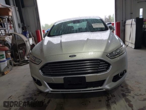 2013 Ford Fusion SE Hybrid with VIN 3FA6P0LU2DR319335, listed as a IAAI auction lot 42007573 with 135,099 mi miles. Bid and sale history available at carsss.com. Image 6.