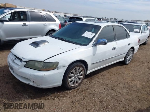 2000 Honda Accord EX z VIN 1HGCG1654YA065958, wystawiony jako IAAI lot #41734784 z przebiegiem 293 577 mil mil oraz . Historia ofert i sprzedaży dostępna na DreamBid. Obrazek 2.