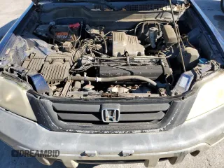 1999 Honda CR-V EX with VIN JHLRD176XXC075179, listed as a Copart auction lot 84598124 with 251,004 mi miles and Salvage Title. Bid and sale history available at carsss.com. Image 12.