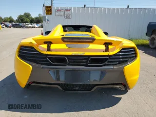 2016 McLaren 650S z VIN SBM11FAA6GW006251, wystawiony jako Copart lot #70628064 z przebiegiem 13 452 mil mil oraz Szkody całkowita. Historia ofert i sprzedaży dostępna na DreamBid. Obrazek 6.