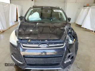 2016 Ford Escape Titanium with VIN 1FMCU0J91GUB09161, listed as a Copart auction lot 50027315 with 106,784 mi miles and Salvage Title. Bid and sale history available at carsss.com. Image 5.