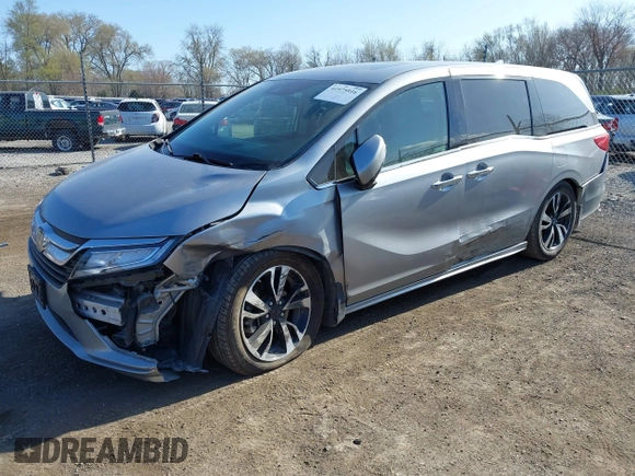 2018 Honda Odyssey Elite z VIN 5FNRL6H91JB070355, wystawiony jako IAAI lot #41975916 z przebiegiem 147 022 mil mil oraz . Historia ofert i sprzedaży dostępna na DreamBid. Obrazek 18.
