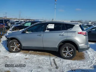 2018 Toyota RAV4 XLE with VIN 2T3RFREV8JW753853, listed as a IAAI auction lot 41526071 with 104,642 mi miles. Bid and sale history available at carsss.com. Image 15.