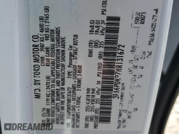 2017 Ford Fusion Titanium with VIN 3FA6P0K97HR131672, listed as a Copart auction lot 50983715 with 123,666 mi miles and Salvage title. Bid and sale history available at DreamBid. Image 12.