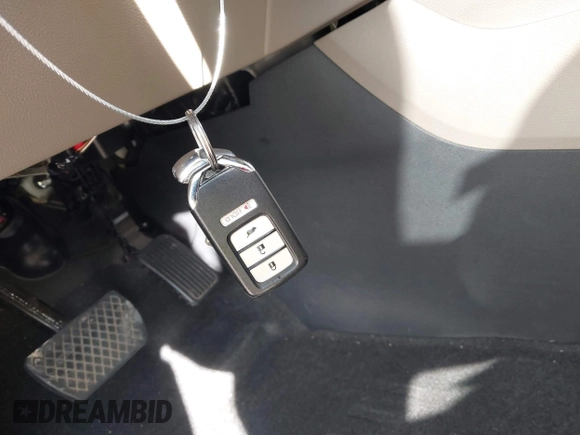 2016 Honda Pilot LX with VIN 5FNYF5H16GB033964, listed as a IAAI auction lot 41607930 with 168,137 mi miles and . Bid and sale history available at DreamBid. Image 11.