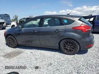 2015 Ford Focus Titanium with VIN 1FADP3N24FL260486, listed as a Copart auction lot 49856865 with Not provided miles and Clean title. Bid and sale history available at DreamBid. Image 2.