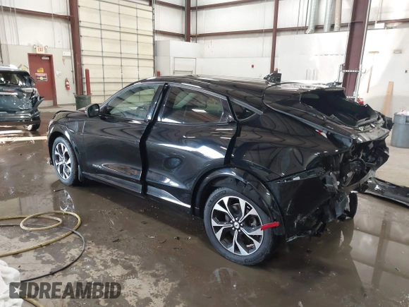 2021 Ford Mustang Mach-E Premium z VIN 3FMTK3SU7MMA04683, wystawiony jako IAAI lot #41605693 z przebiegiem 56 801 mil mil oraz . Historia ofert i sprzedaży dostępna na DreamBid. Obrazek 3.