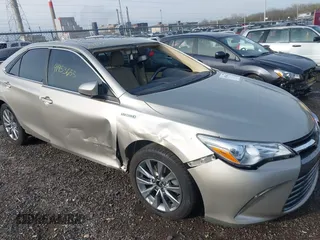 2017 Toyota Camry Hybrid LE with VIN 4T1BD1FK9HU214495, listed as a IAAI auction lot 41953655 with 106,409 mi miles. Bid and sale history available at carsss.com. Image 6.
