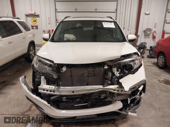2022 Honda Pilot Special Edition with VIN 5FNYF6H27NB105041, listed as a IAAI auction lot 41916708 with 15,848 mi miles and . Bid and sale history available at DreamBid. Image 13.