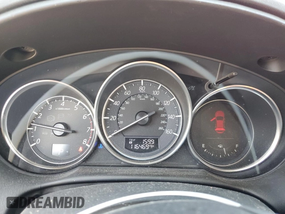 2016 Mazda CX-5 Grand Touring z VIN JM3KE2DYXG0840777, wystawiony jako Copart lot #49700585 z przebiegiem 116 469 mil mil oraz Szkoda całkowita • Salvage title. Historia ofert i sprzedaży dostępna na DreamBid. Obrazek 9.