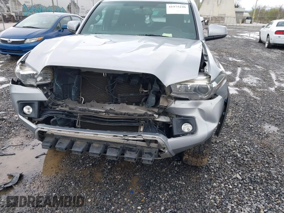 2016 Toyota Tacoma SR with VIN 5TFCZ5AN5GX026458, listed as a IAAI auction lot 41975246 with 208,401 mi miles and . Bid and sale history available at DreamBid. Image 6.