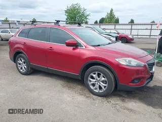 2015 Mazda CX-9 Touring z VIN JM3TB3CV2F0457280, wystawiony jako IAAI lot #42287672 z przebiegiem 191 522 mil mil oraz . Historia ofert i sprzedaży dostępna na DreamBid. Obrazek 1.