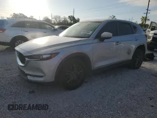 2020 Mazda CX-5 Touring with VIN JM3KFACM8L0764878, listed as a Copart auction lot 49303865 with 114,890 mi miles and Salvage Title. Bid and sale history available at carsss.com. Image 1.