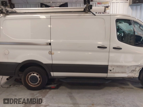 2020 Ford Transit Cargo with VIN 1FTBR1Y81LKA19650, listed as a IAAI auction lot 42727232 with 103,676 mi miles and . Bid and sale history available at DreamBid. Image 13.