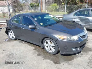 2009 Acura TSX with VIN JH4CU26659C027813, listed as a IAAI auction lot 41848415 with 216,257 mi miles. Bid and sale history available at carsss.com. Image 1.