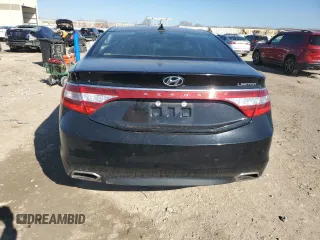 2017 Hyundai Azera Limited z VIN KMHFH4JG9HA581134, wystawiony jako Copart lot #49957615 z przebiegiem Nie podano mil oraz Szkoda całkowita • Salvage title. Historia ofert i sprzedaży dostępna na DreamBid. Obrazek 6.