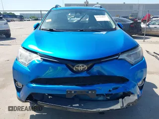 2018 Toyota RAV4 XLE with VIN JTMWFREV2JJ168557, listed as a IAAI auction lot 41994837 with 107,636 mi miles. Bid and sale history available at carsss.com. Image 12.