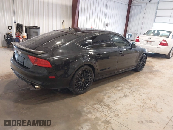 2015 Audi S7 with VIN WAUW2AFC0FN015327, listed as a IAAI auction lot 41964788 with 145,953 mi miles. Bid and sale history available at carsss.com. Image 4.
