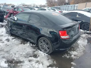 2013 Scion tC with VIN JTKJF5C72D3055801, listed as a IAAI auction lot 41102753 with 242,146 mi miles. Bid and sale history available at carsss.com. Image 3.