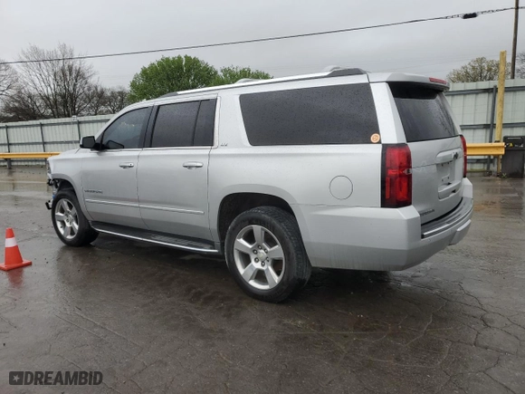 2015 Chevrolet Suburban LTZ with VIN 1GNSCKKCXFR587516, listed as a Copart auction lot 50877665 with 193,618 mi miles and Salvage Title. Bid and sale history available at carsss.com. Image 2.