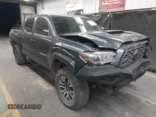 2021 Toyota Tacoma SR z VIN 5TFCZ5AN5MX250437, wystawiony jako IAAI lot #41979360 z przebiegiem 125 315 mil mil oraz . Historia ofert i sprzedaży dostępna na DreamBid. Obrazek 1.