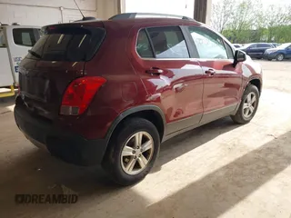 2016 Chevrolet Trax LT with VIN 3GNCJPSB6GL135019, listed as a IAAI auction lot 42212572 with 101,282 mi miles and . Bid and sale history available at DreamBid. Image 4.