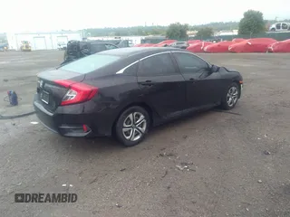 2017 Honda Civic LX with VIN 2HGFC2F58HH570210, listed as a IAAI auction lot 40446375 with 69,724 mi miles and . Bid and sale history available at DreamBid. Image 4.